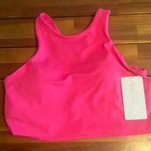 Brand new, never worn. Fits size 8/10. Size large. Wear as tank for workouts.